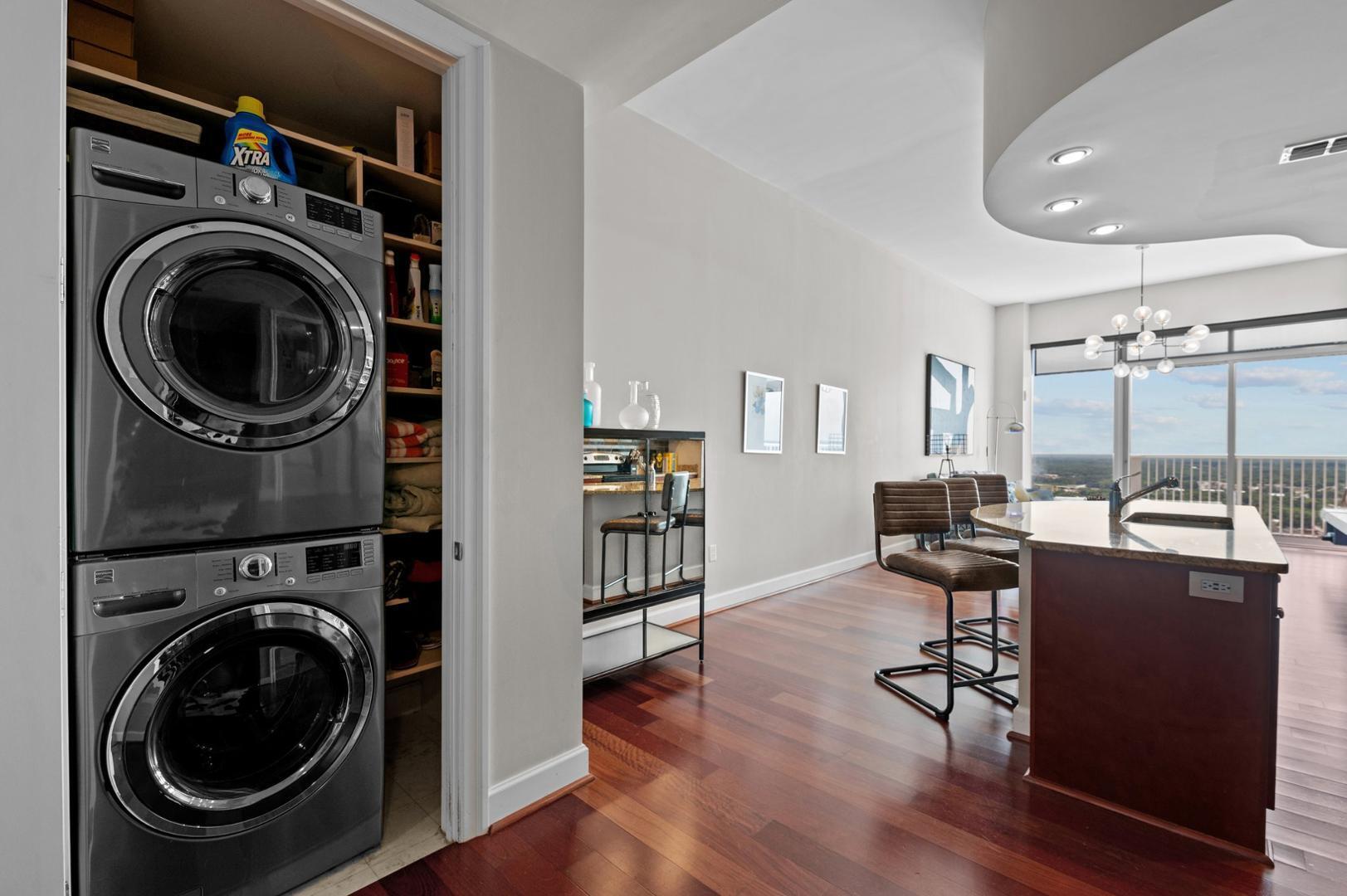 301 Fayetteville Street, Unit 33111 Raleigh, NC 27601 - Photo 14 of 64 a view of a workspace with furniture and wooden floor