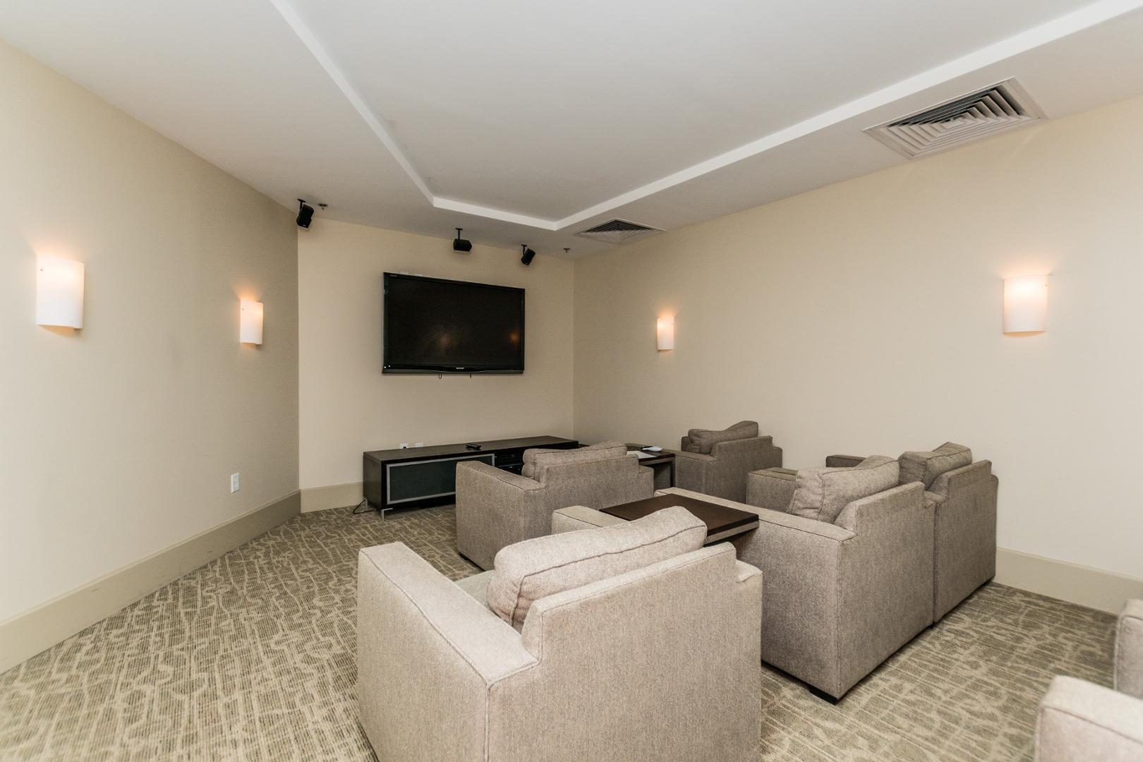 301 Fayetteville Street, Unit 33111 Raleigh, NC 27601 - Photo 31 of 64 a living room with furniture and a flat screen tv