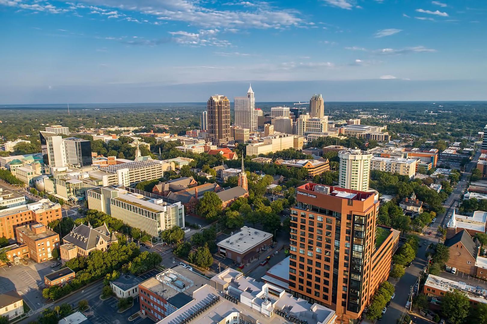301 Fayetteville Street, Unit 33111 Raleigh, NC 27601 - Photo 41 of 64 an aerial view of city and lake