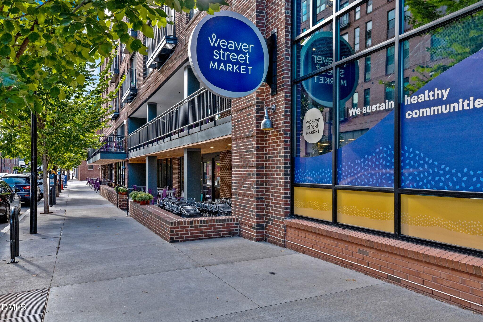 301 Fayetteville Street, Unit 33111 Raleigh, NC 27601 - Photo 46 of 64 a view of an chairs and sign on the wall