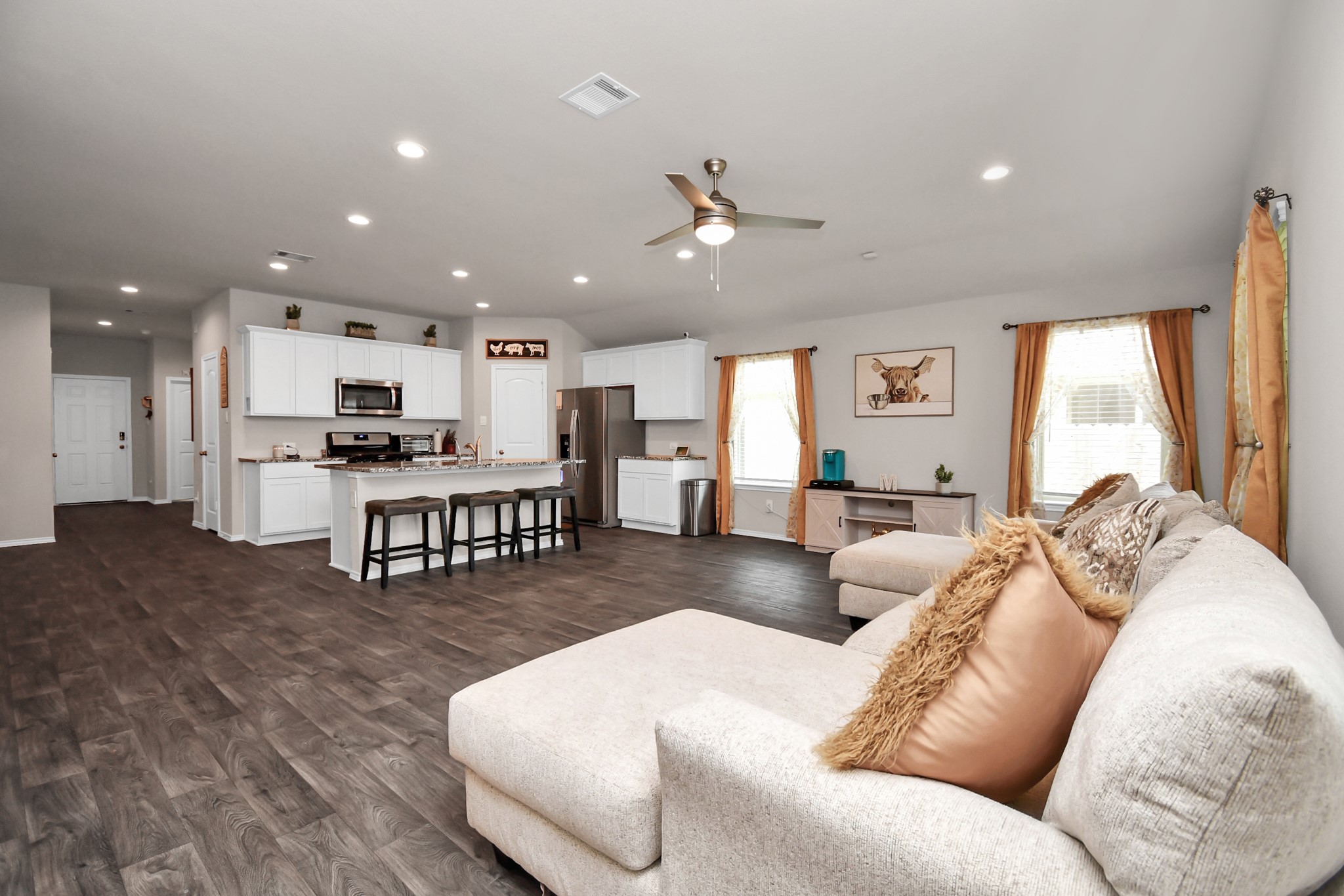 3610 Crimson Embers Lane Conroe, TX 77301 - Photo 18 of 41 a living room with furniture and kitchen view