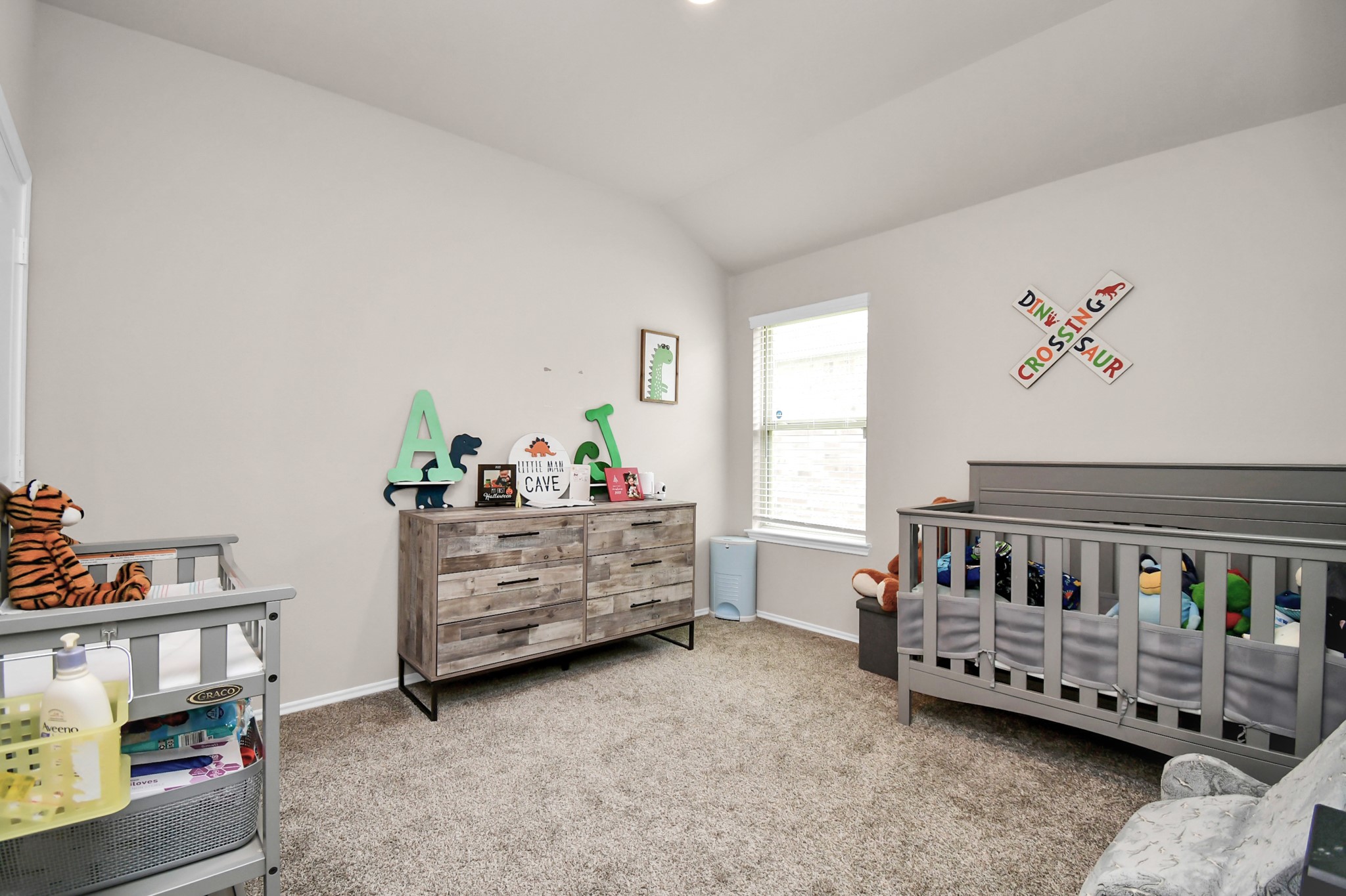 3610 Crimson Embers Lane Conroe, TX 77301 - Photo 22 of 41 a bedroom with furniture and a window