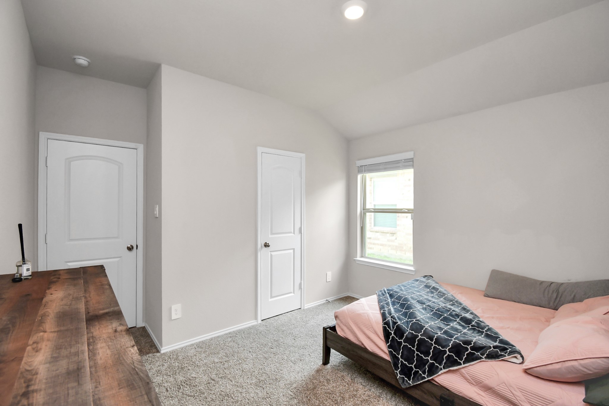 3610 Crimson Embers Lane Conroe, TX 77301 - Photo 25 of 41 a bedroom with bed and window