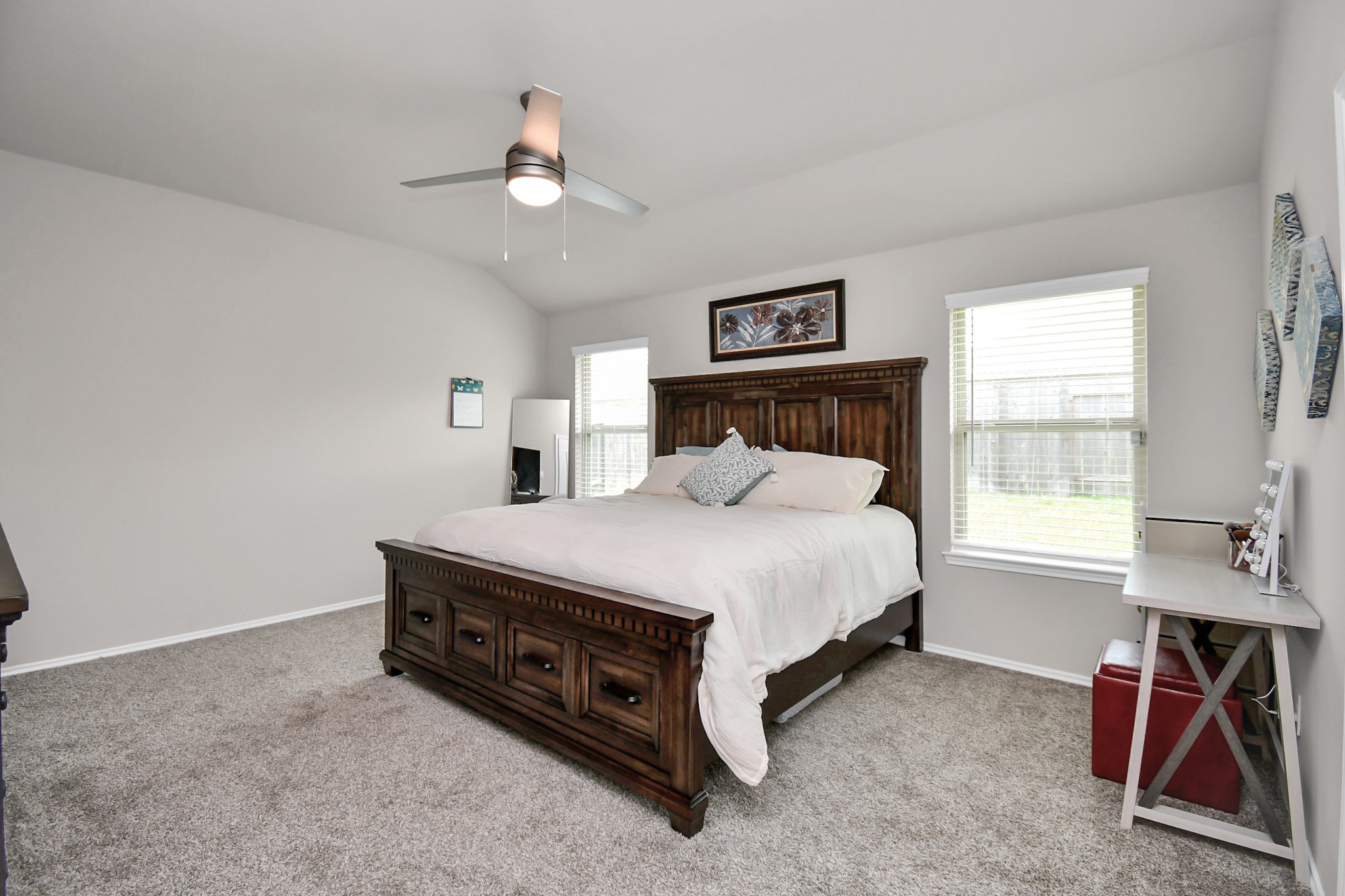 3610 Crimson Embers Lane Conroe, TX 77301 - Photo 27 of 41 a bedroom with a bed and a window