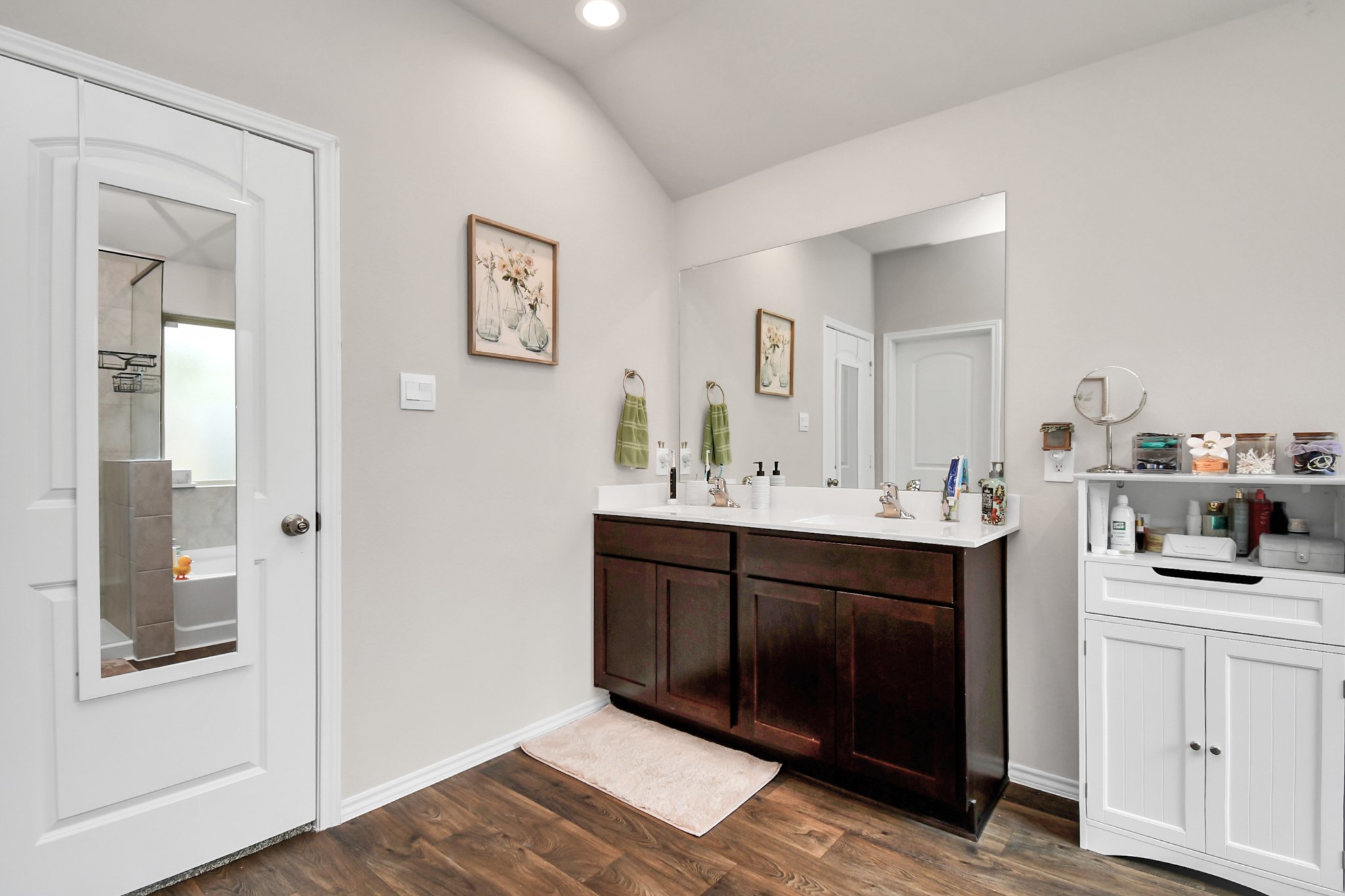 3610 Crimson Embers Lane Conroe, TX 77301 - Photo 31 of 41 a bathroom with a sink vanity and mirror