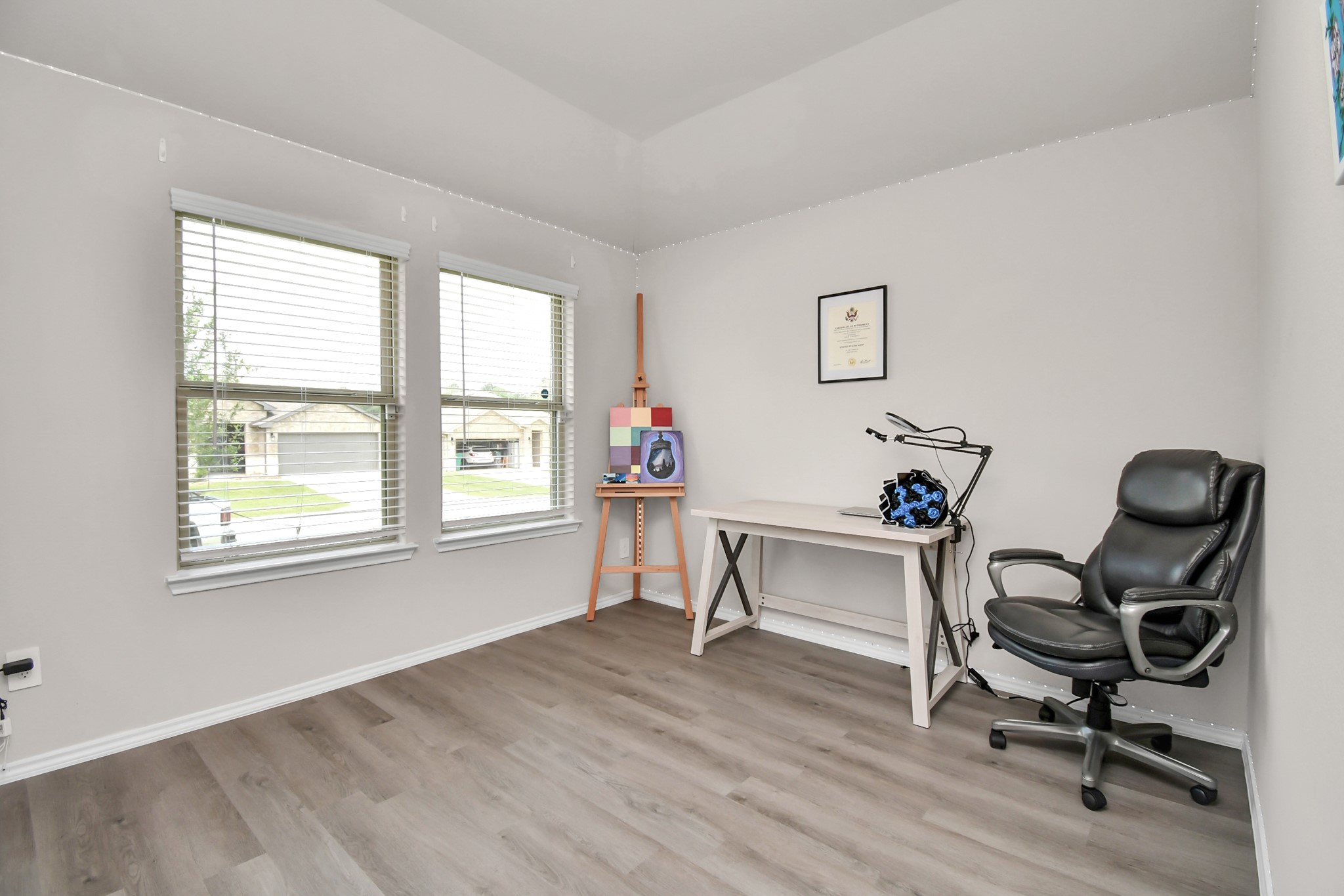 3610 Crimson Embers Lane Conroe, TX 77301 - Photo 4 of 41 a workspace with furniture and a window