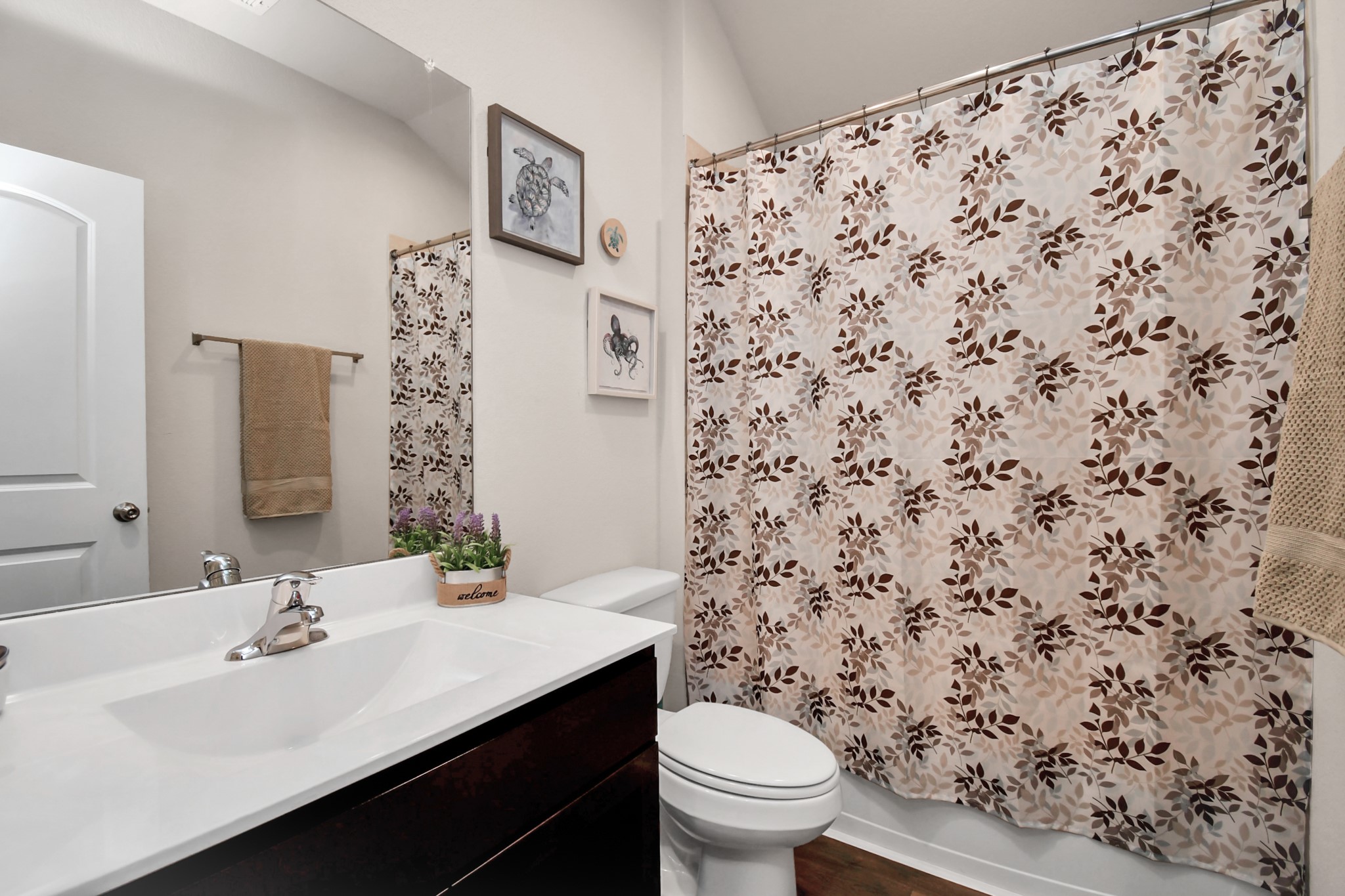 3610 Crimson Embers Lane Conroe, TX 77301 - Photo 6 of 41 a bathroom with a sink toilet and mirror