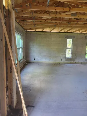 a view of a room with a windows