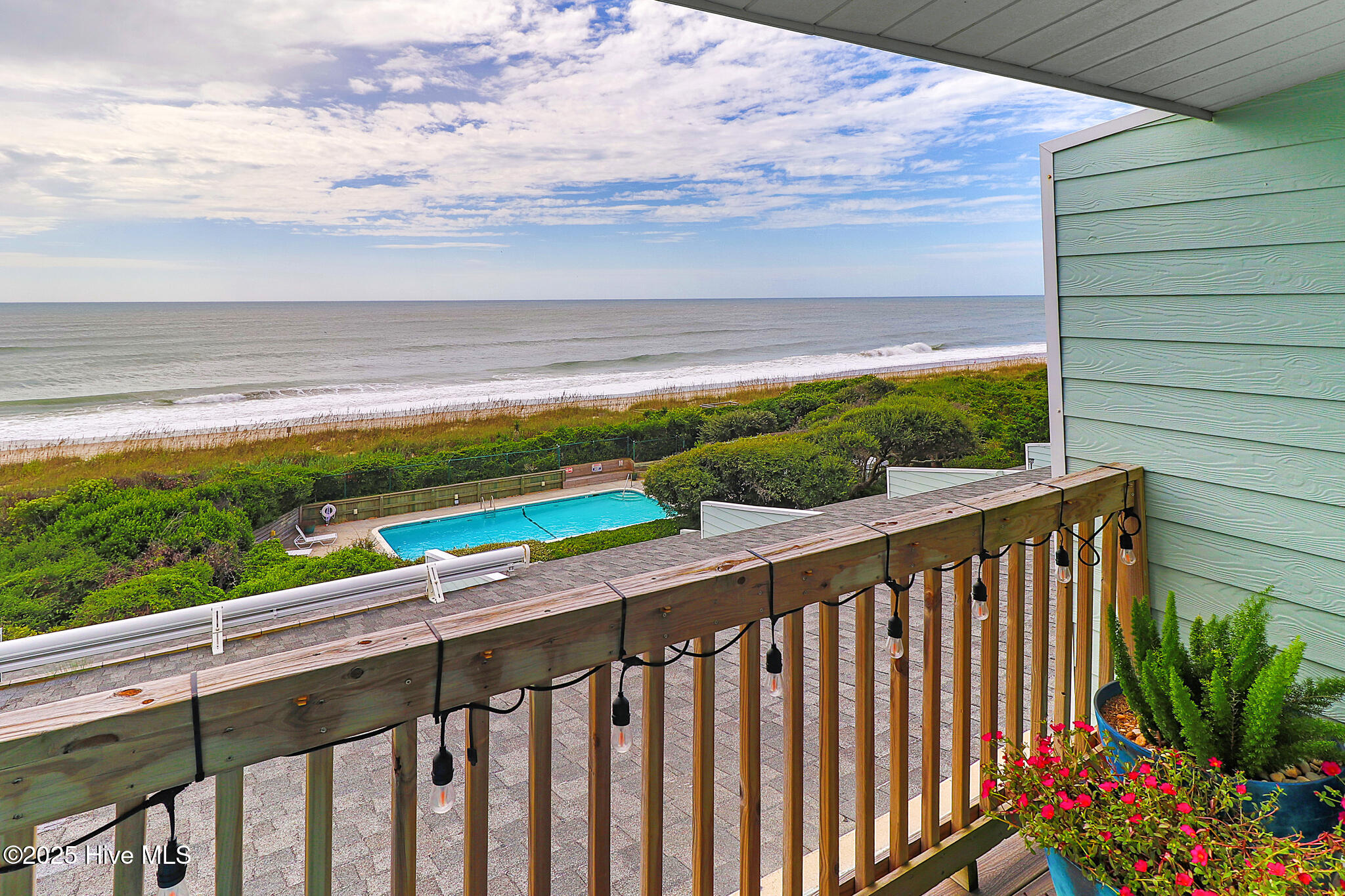 535 Salter Path Road, Unit 15 CORAL SHORES Pine Knoll Shores, NC 28512 - Photo 7 of 43 Deck overviewing Pool and Ocean