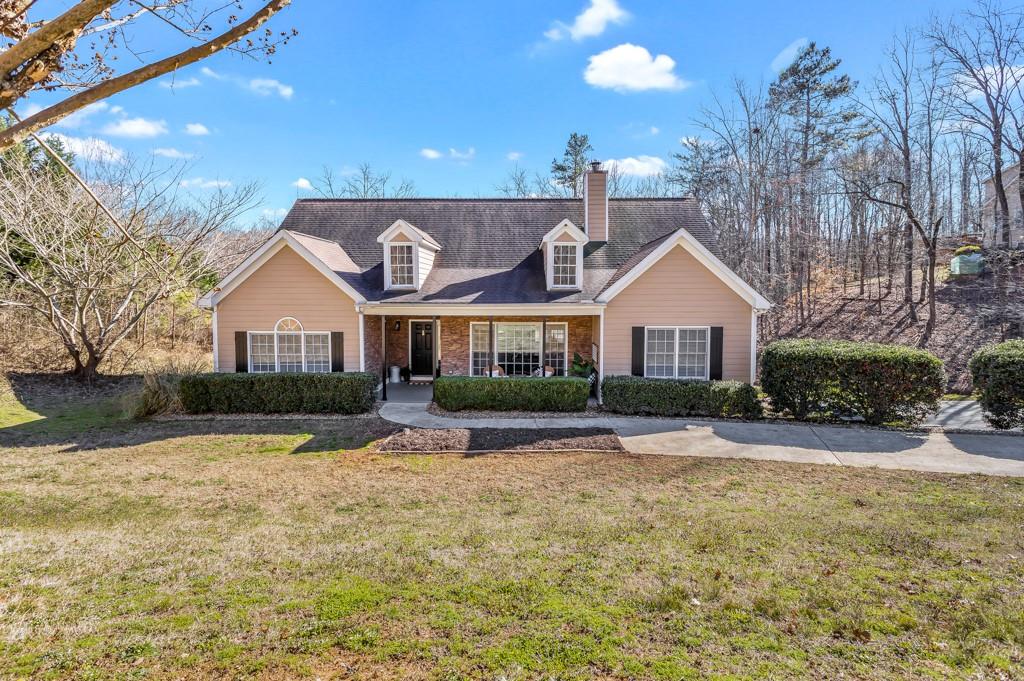 5950 Julian Road Gainesville, GA 30506 - Photo 1 of 1 a front view of a house with a yard and garage
