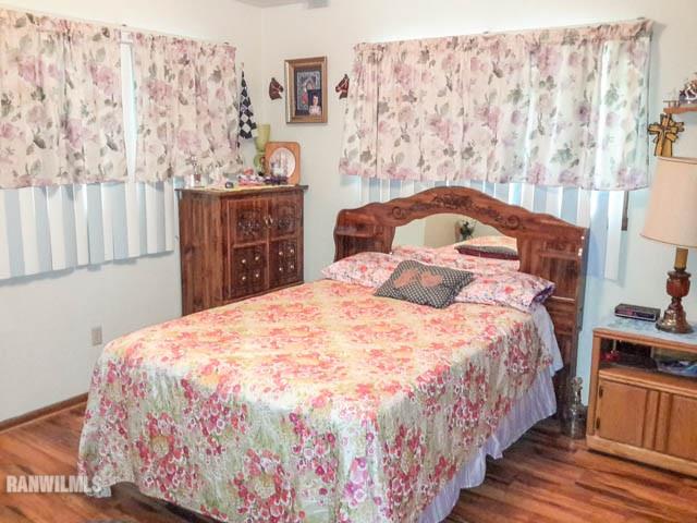 12289 Tresemer Road Roscoe, IL 61073 - Photo 12 of 25 a bedroom with a bed and a window