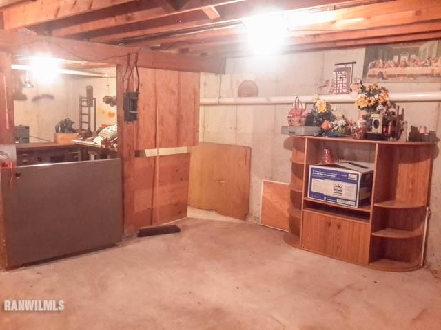 12289 Tresemer Road Roscoe, IL 61073 - Photo 15 of 25 a view of a refrigerator and more cabinets