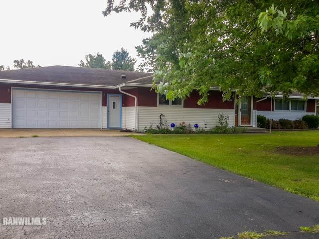 12289 Tresemer Road Roscoe, IL 61073 - Photo 19 of 25 a view of a house with a big yard and large tree