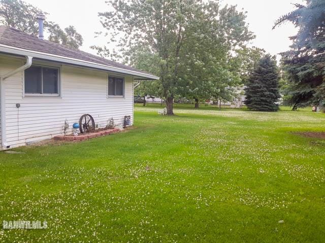12289 Tresemer Road Roscoe, IL 61073 - Photo 20 of 25 a house view with a garden space
