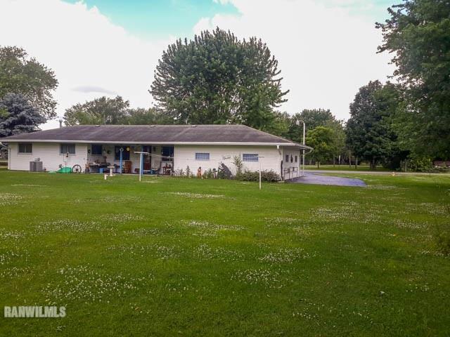 12289 Tresemer Road Roscoe, IL 61073 - Photo 23 of 25 a front view of house with yard and green space