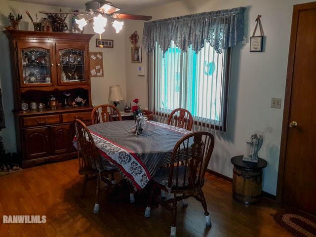 12289 Tresemer Road Roscoe, IL 61073 - Photo 4 of 25 a view of a dining room with furniture and window
