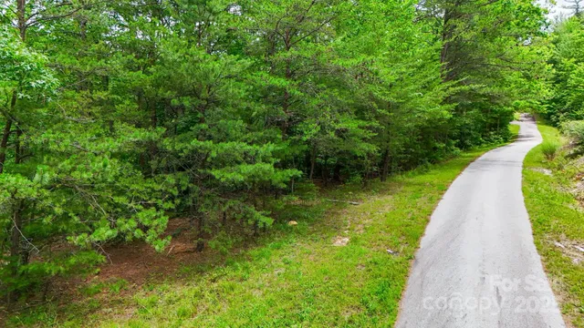 a view of a lake with a building in the background