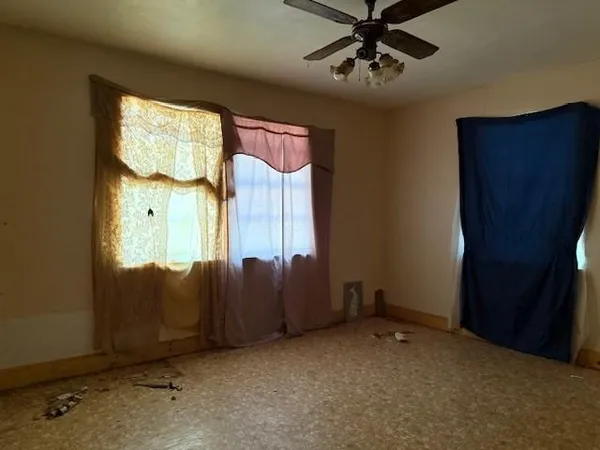 an empty room with windows