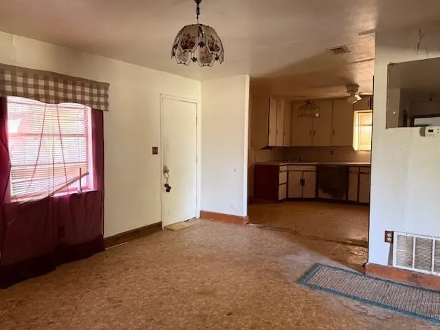 a view of a livingroom with a chandelier