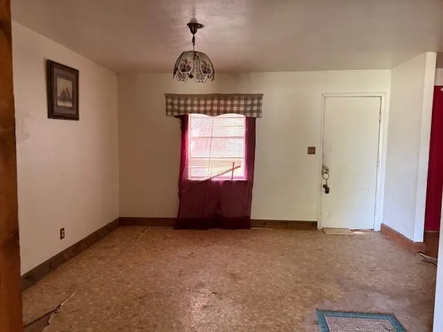 an empty room with a window