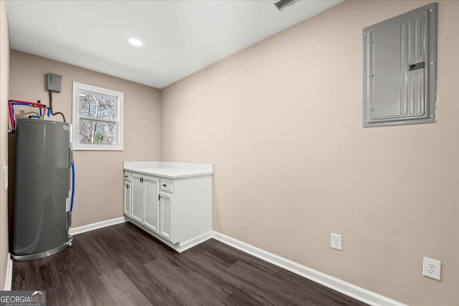 401 Baltimore Road Washington, GA 30673 - Photo 16 of 22 a view of a room with closet and wooden floor