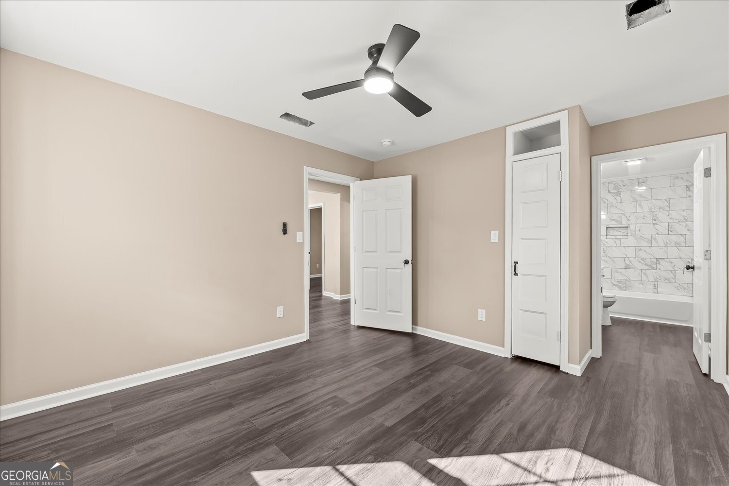401 Baltimore Road Washington, GA 30673 - Photo 18 of 22 a view of an empty room and wooden floor