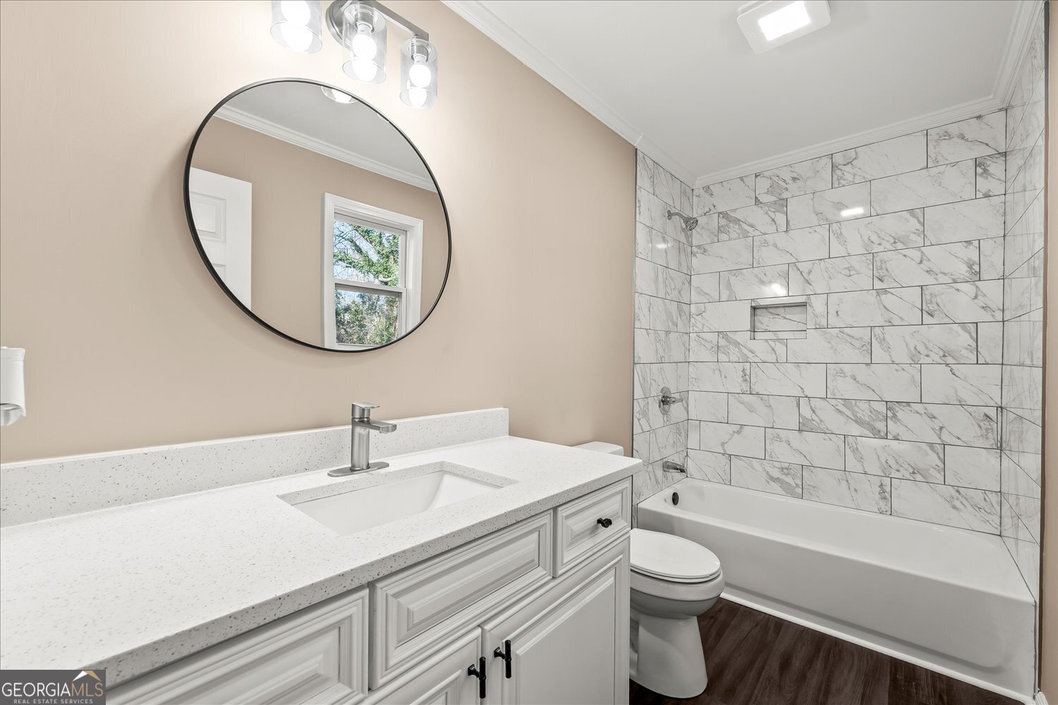 401 Baltimore Road Washington, GA 30673 - Photo 19 of 22 a bathroom with a sink a toilet and a mirror