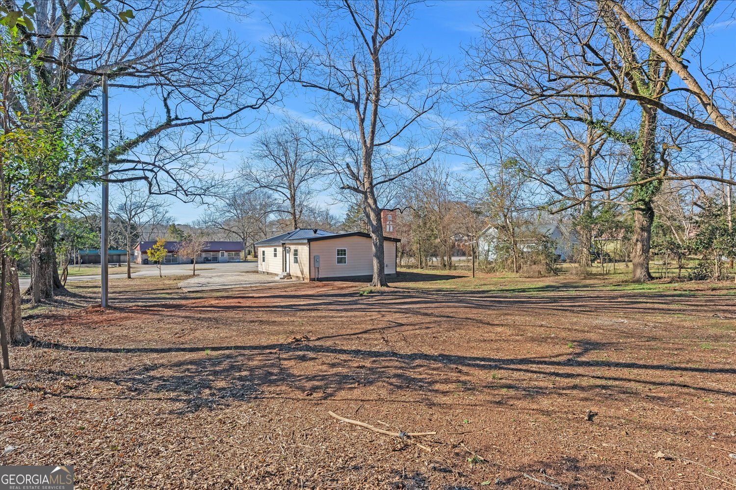 401 Baltimore Road Washington, GA 30673 - Photo 22 of 22 a view of road with large trees