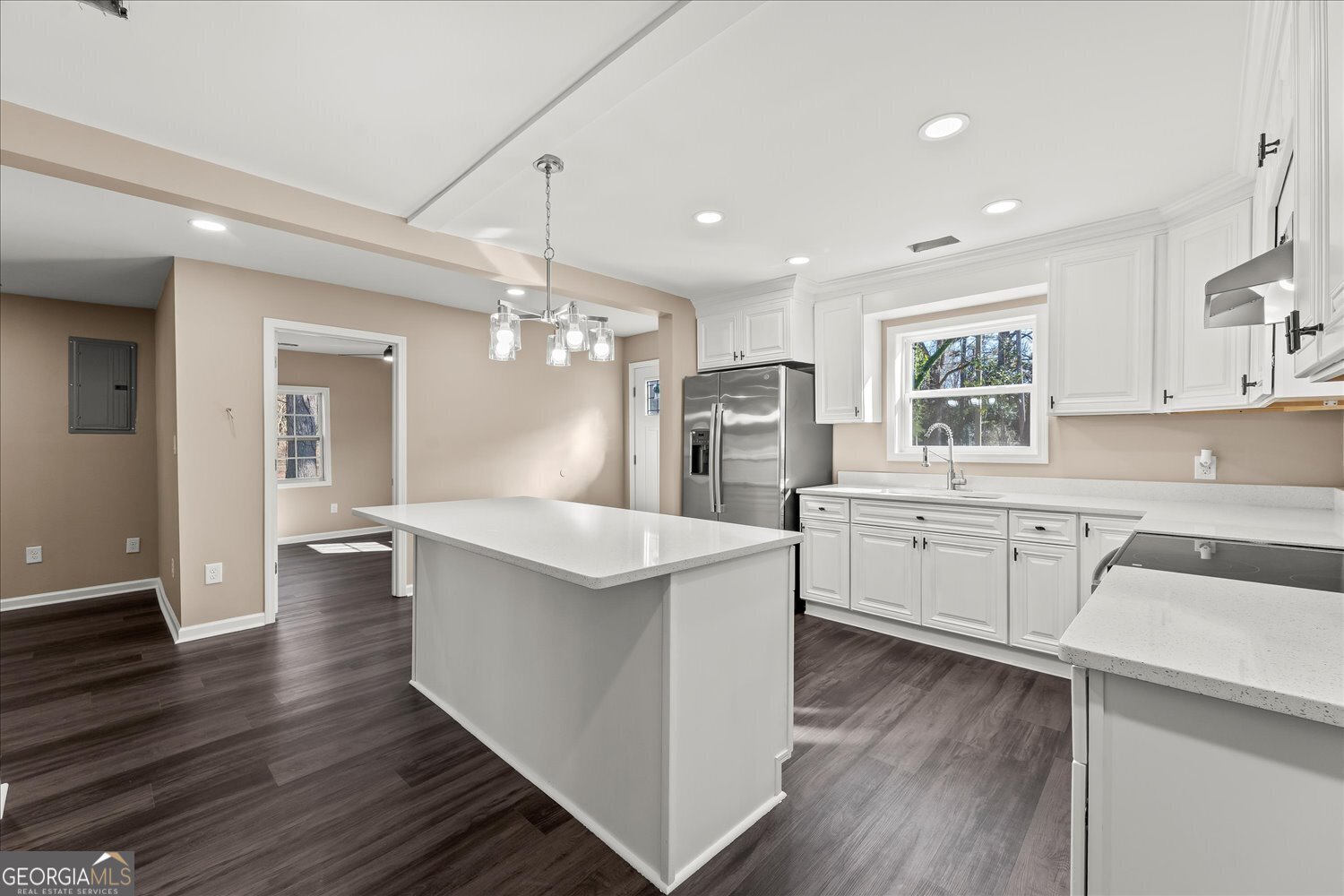 401 Baltimore Road Washington, GA 30673 - Photo 9 of 22 a kitchen with white cabinets and sink