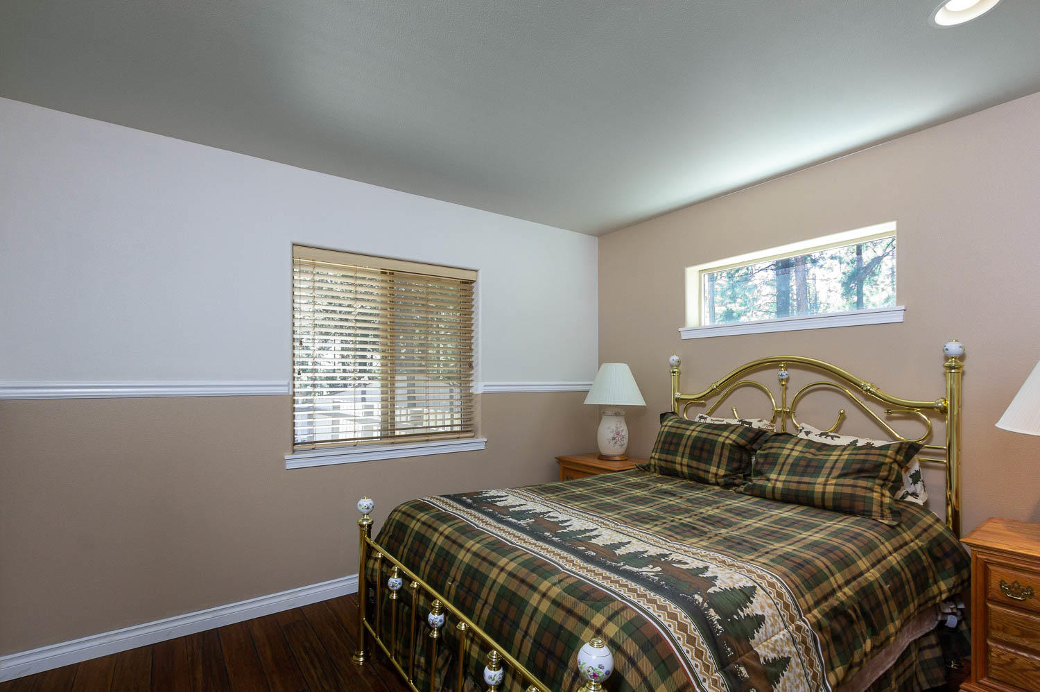 17151 Merced Road Bend, OR 97707 - Photo 20 of 30 a bedroom with a bed and a window
