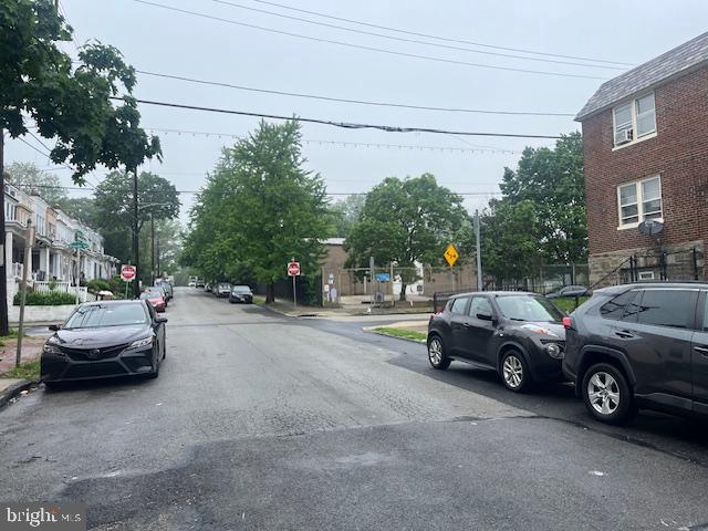 6339 Morton Street Philadelphia, PA 19144 - Photo 3 of 14 a view of street with parked cars