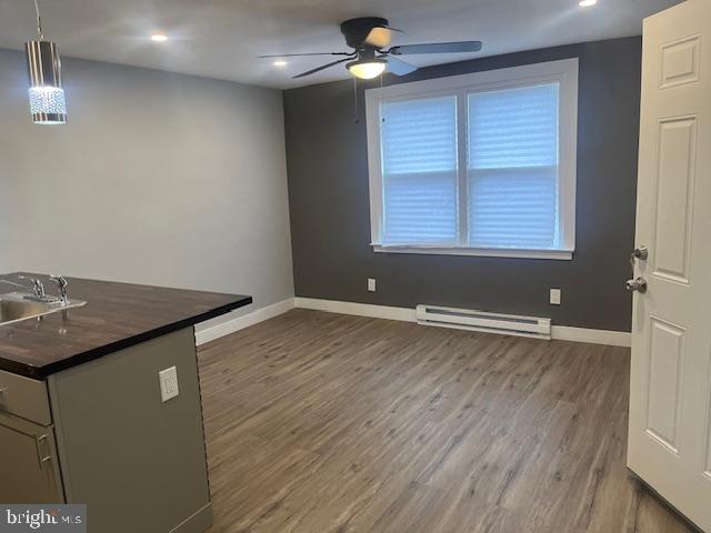 6339 Morton Street Philadelphia, PA 19144 - Photo 6 of 14 wooden floor in an empty room with a window
