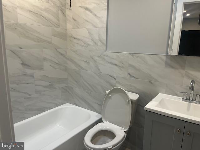 6339 Morton Street Philadelphia, PA 19144 - Photo 9 of 14 a bathroom with a sink toilet and shower