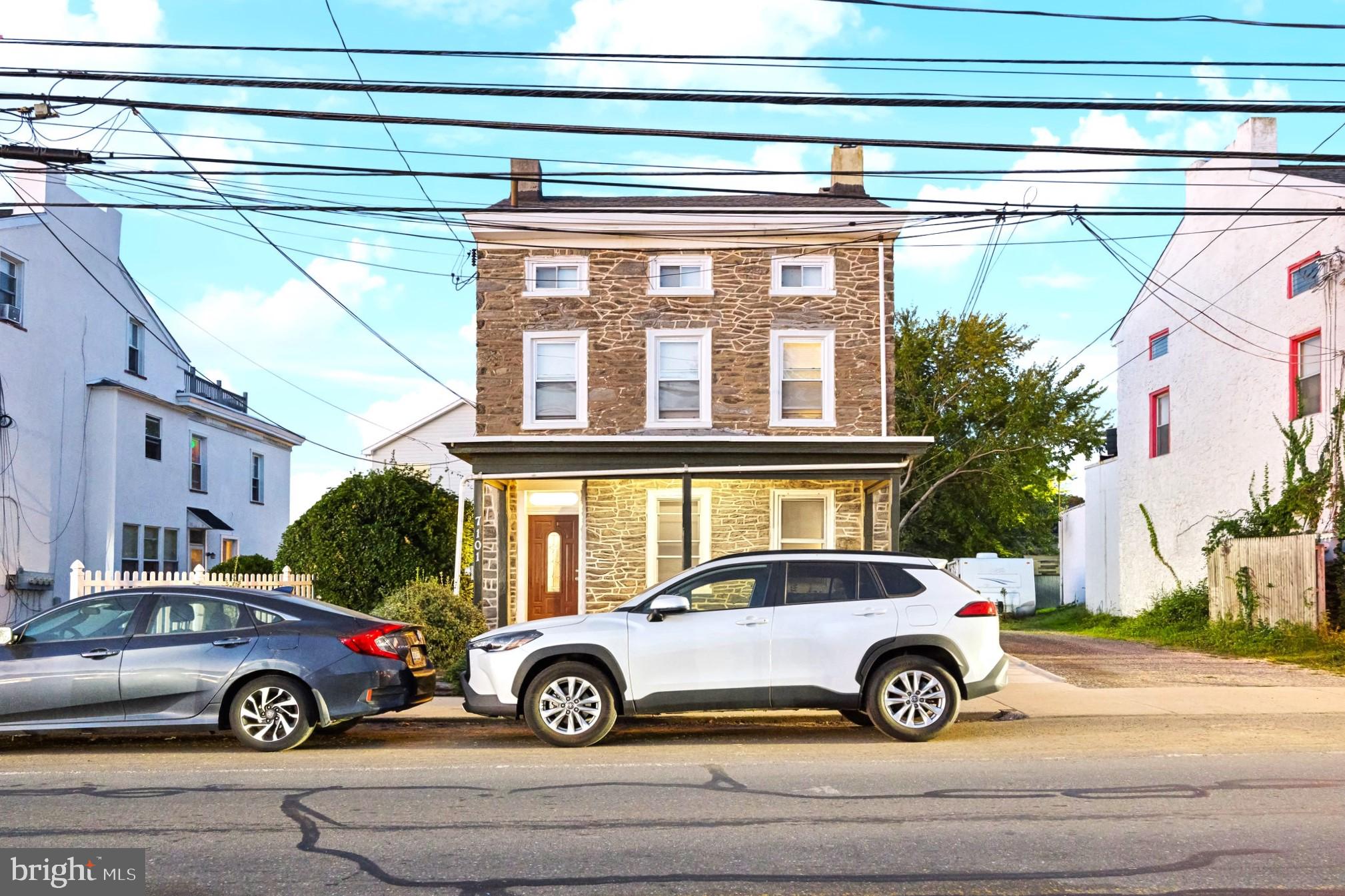 7101 Ridge Avenue Philadelphia, PA 19128 - Photo 1 of 19 a car parked in front of a house