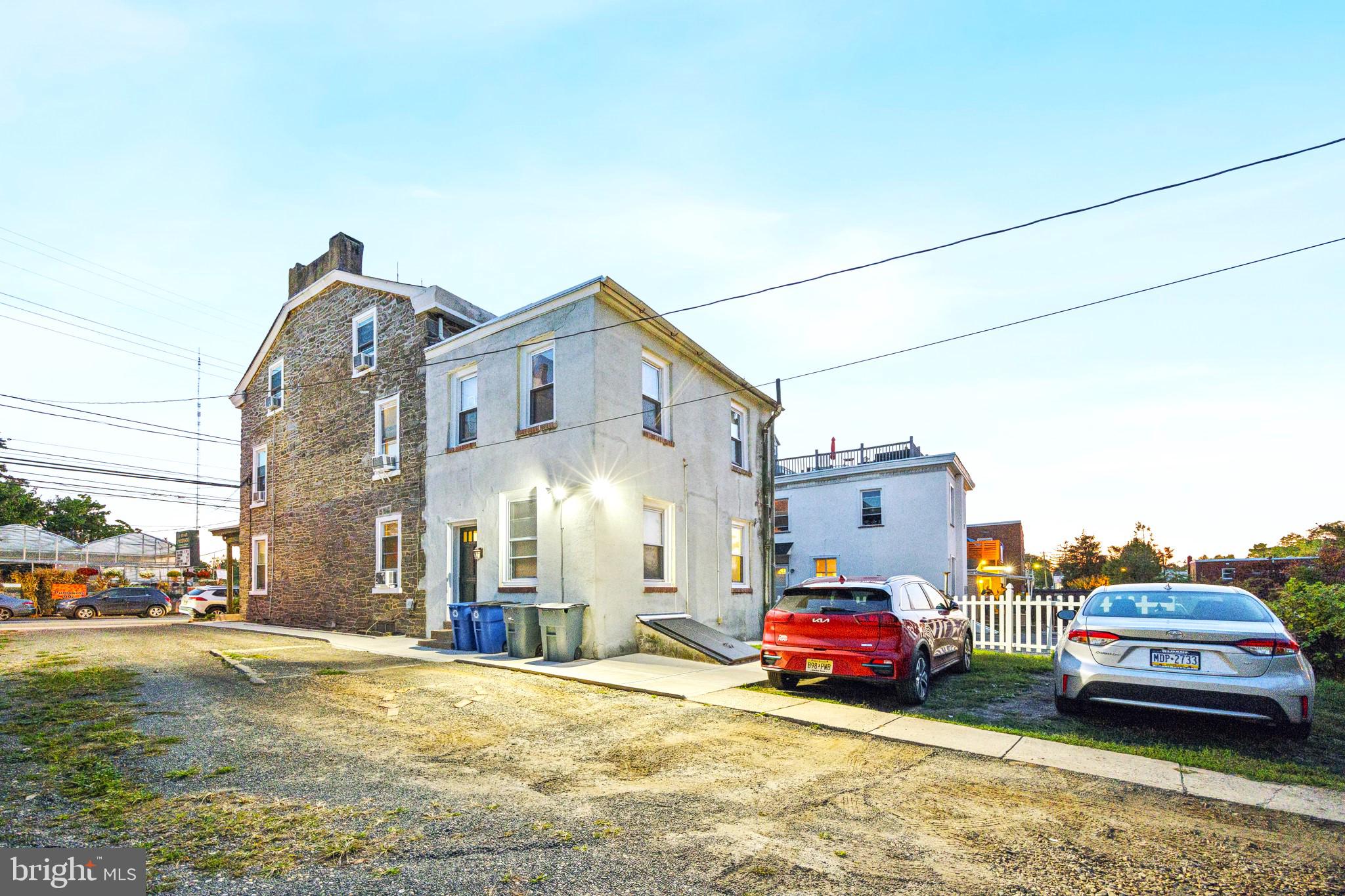 7101 Ridge Avenue Philadelphia, PA 19128 - Photo 3 of 19 a car parked in front of a house