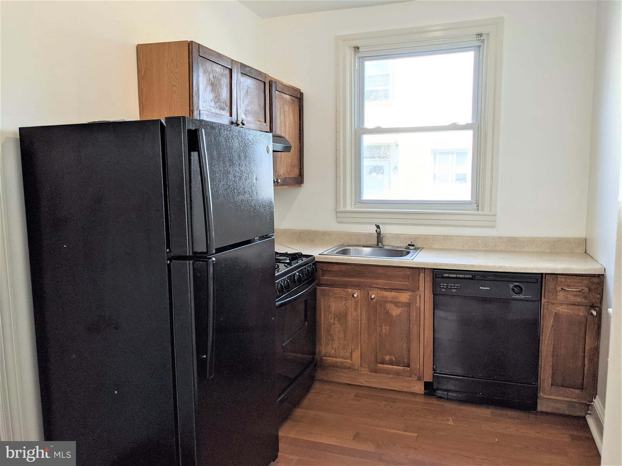 7101 Ridge Avenue Philadelphia, PA 19128 - Photo 7 of 19 a kitchen with stainless steel appliances granite countertop a refrigerator and a sink