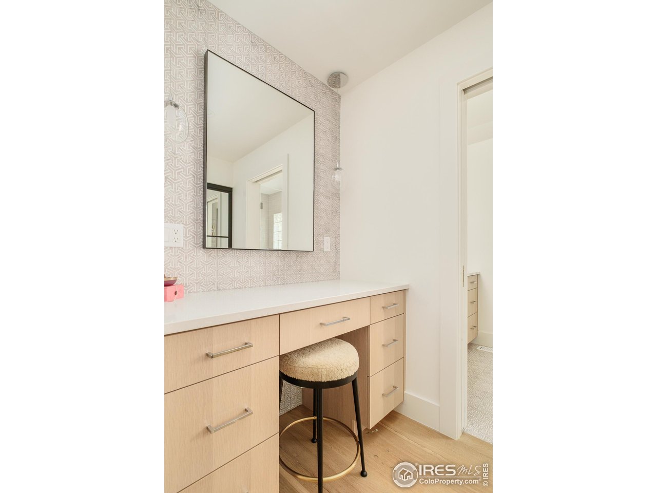 656 Juniper Avenue Boulder, CO 80304 - Photo 23 of 49 a bathroom with a toilet and a mirror