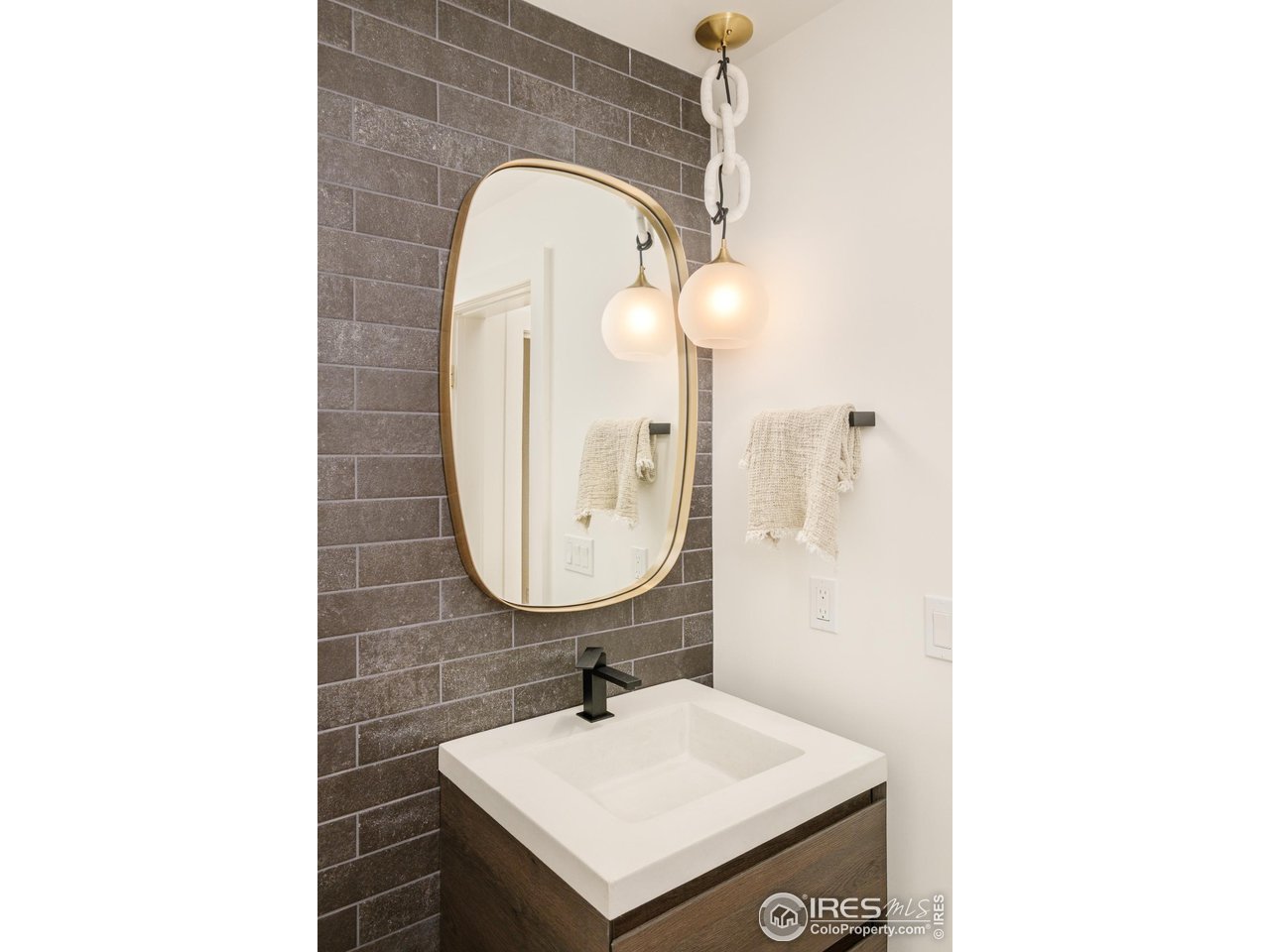 656 Juniper Avenue Boulder, CO 80304 - Photo 26 of 49 a bathroom with a sink and a mirror