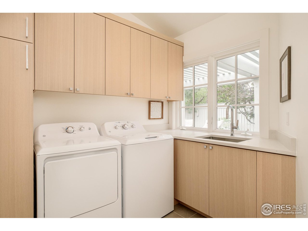 656 Juniper Avenue Boulder, CO 80304 - Photo 39 of 49 a utility room with dryer and washer