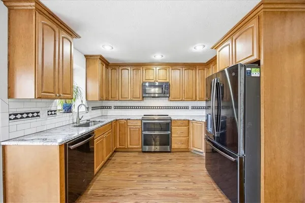 $365,000 | 1104 Southeast 7th Street, Lee's Summit, MO 64063