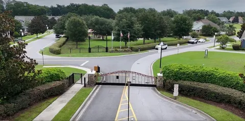 a view of a garden with swimming pool