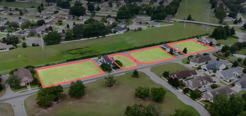 Tbd Southeast 47th Terrace Ocala, FL 34480 - Photo 9 of 18 an aerial view of a tennis ground and a cars park side of the road