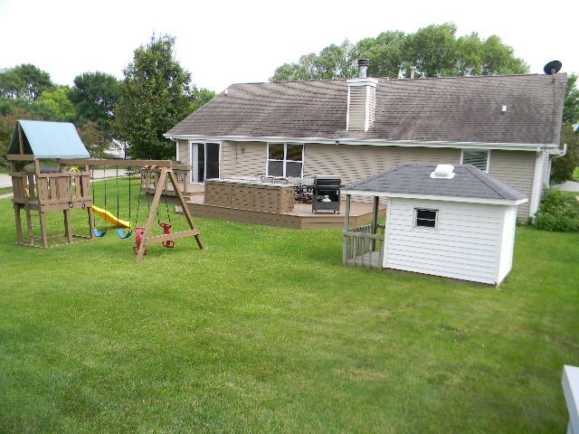 6688 North Point Road Rockford, IL 61108 - Photo 24 of 24 a view of a house with a backyard
