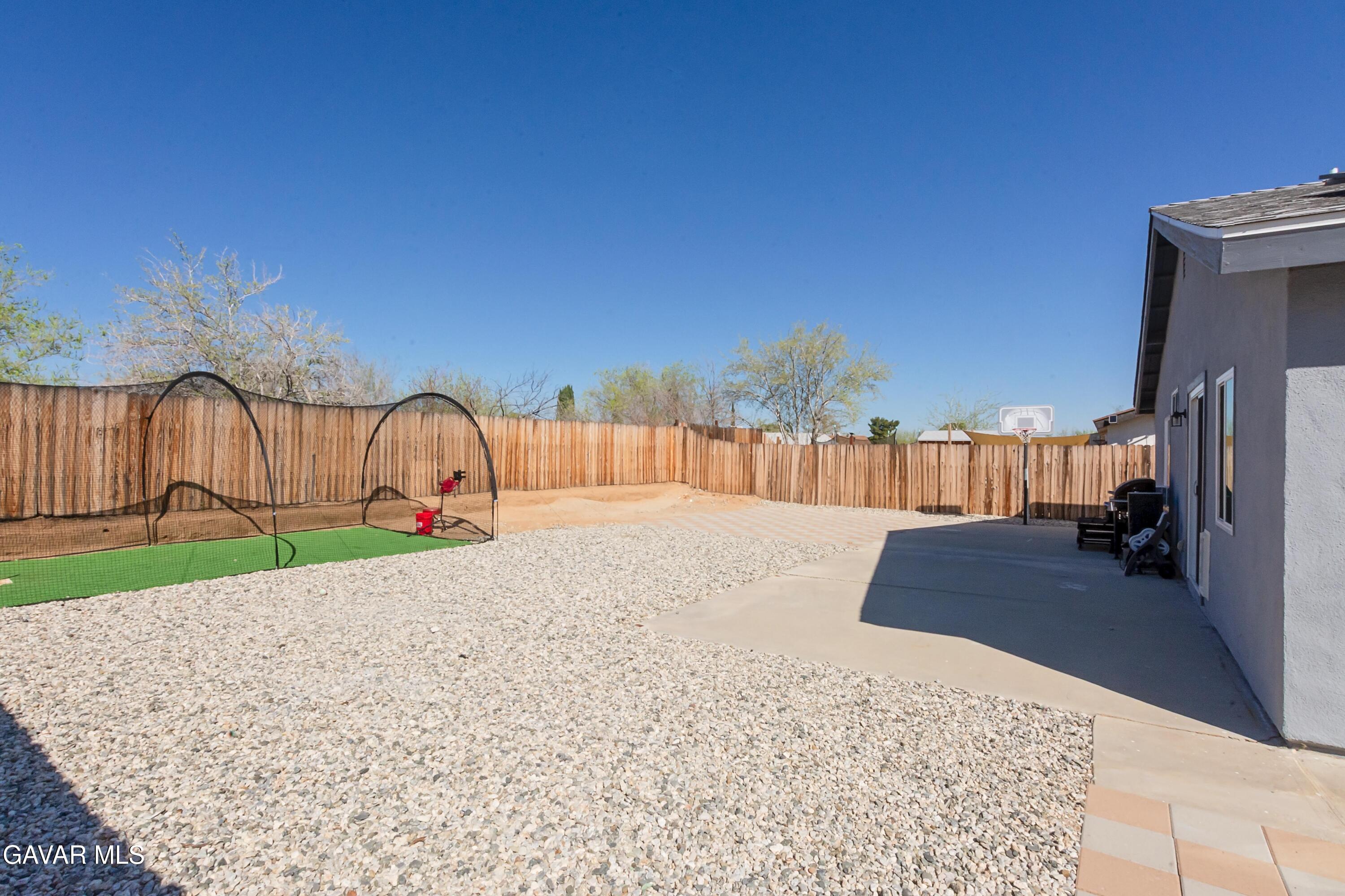 42933 Alexo Drive Lancaster, CA 93536 - Photo 30 of 32 a view of a backyard