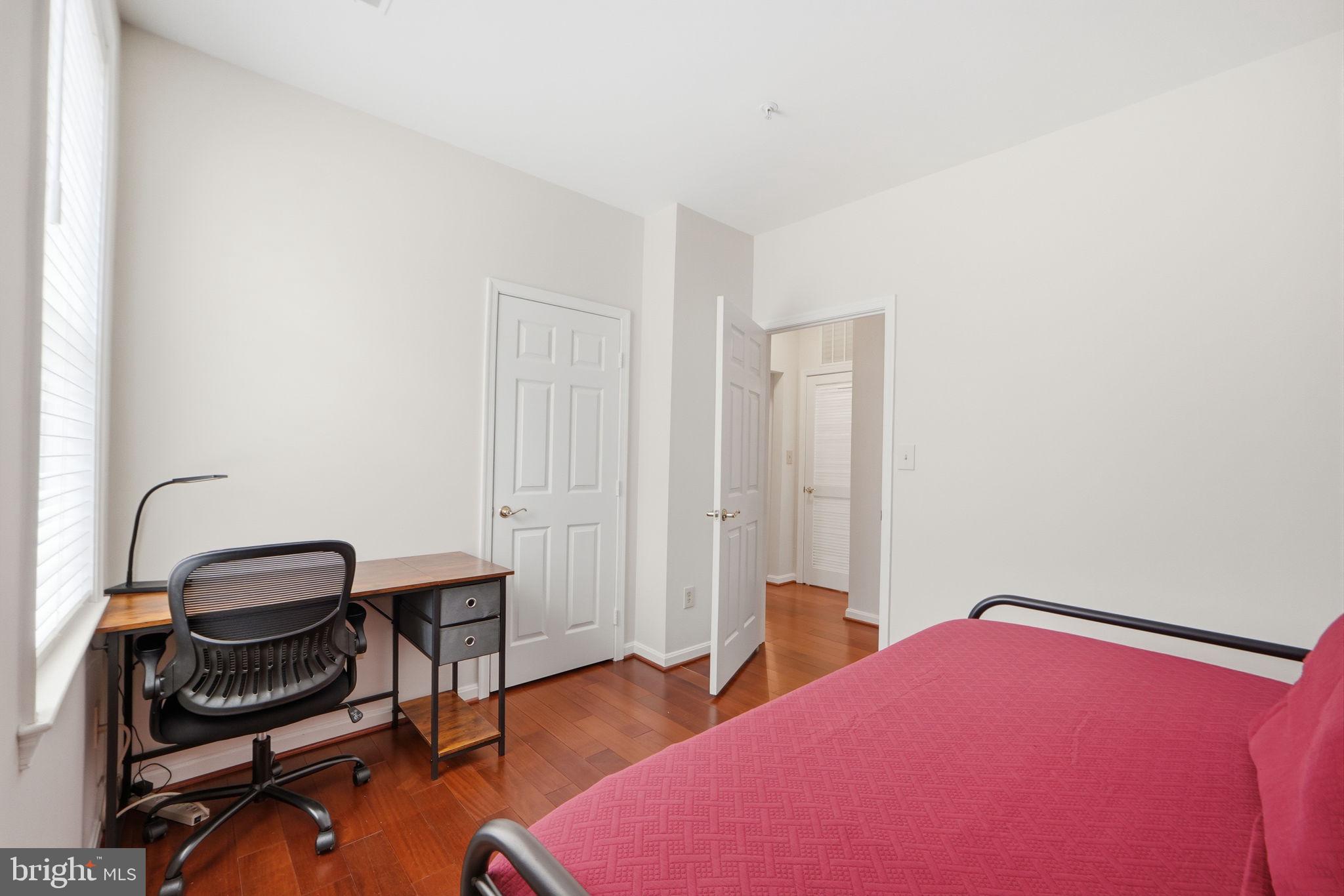 7023 Haycock Road Falls Church, VA 22043 - Photo 14 of 22 a bedroom with a bed and a desk