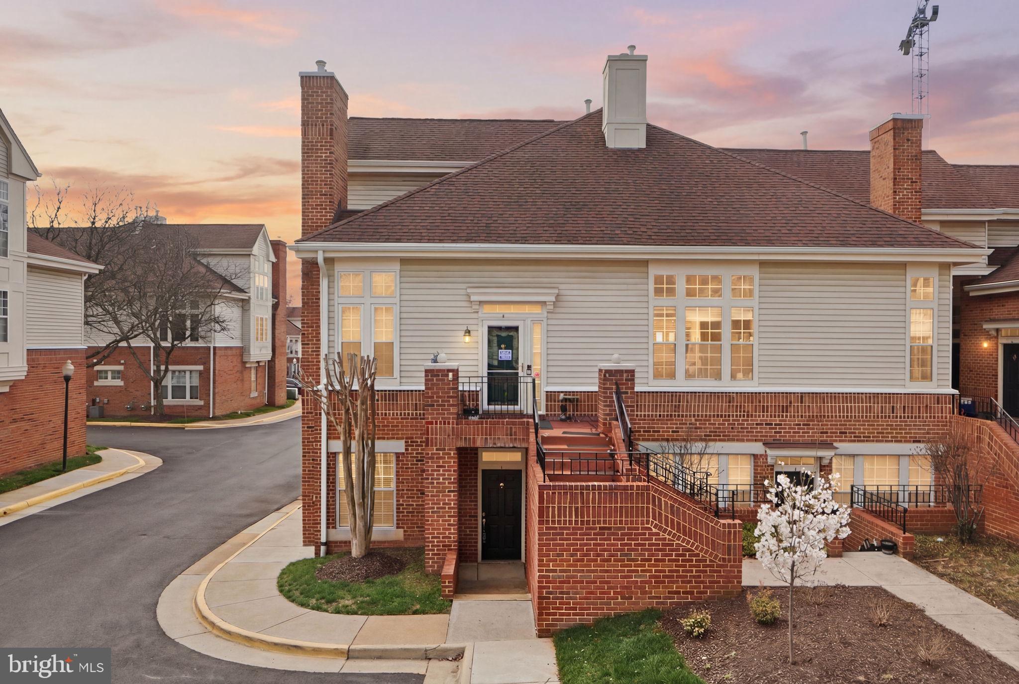 7023 Haycock Road Falls Church, VA 22043 - Photo 2 of 22 a front view of a house with garden