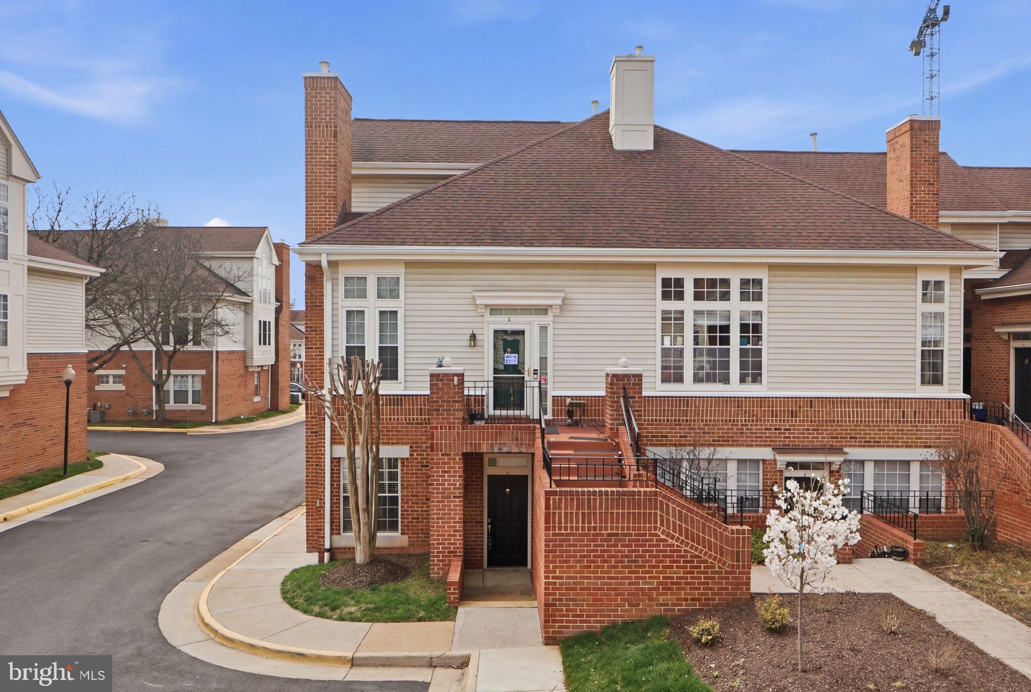 7023 Haycock Road Falls Church, VA 22043 - Photo 3 of 22 a front view of a house with a porch