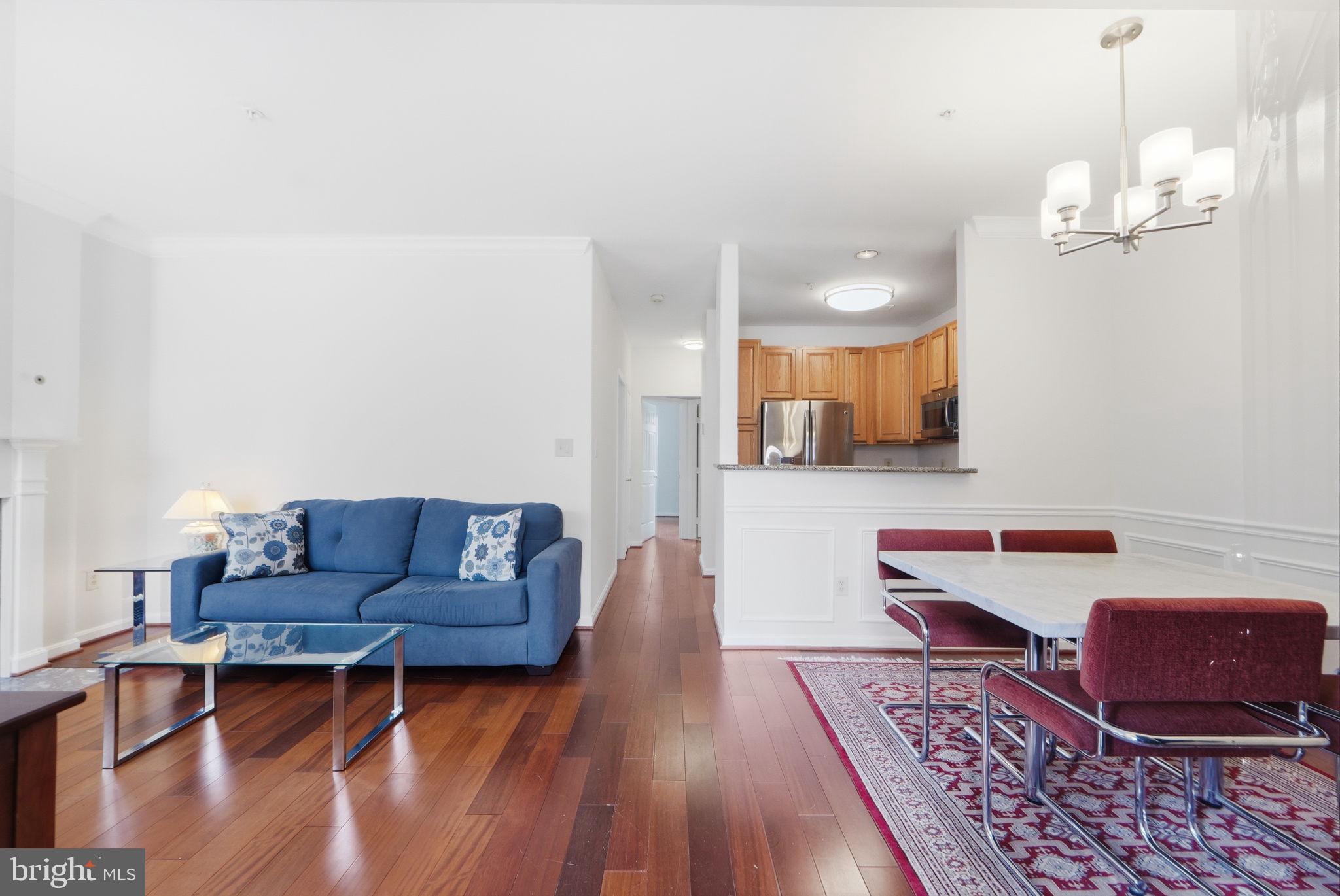 7023 Haycock Road Falls Church, VA 22043 - Photo 4 of 22 a living room with furniture and wooden floor
