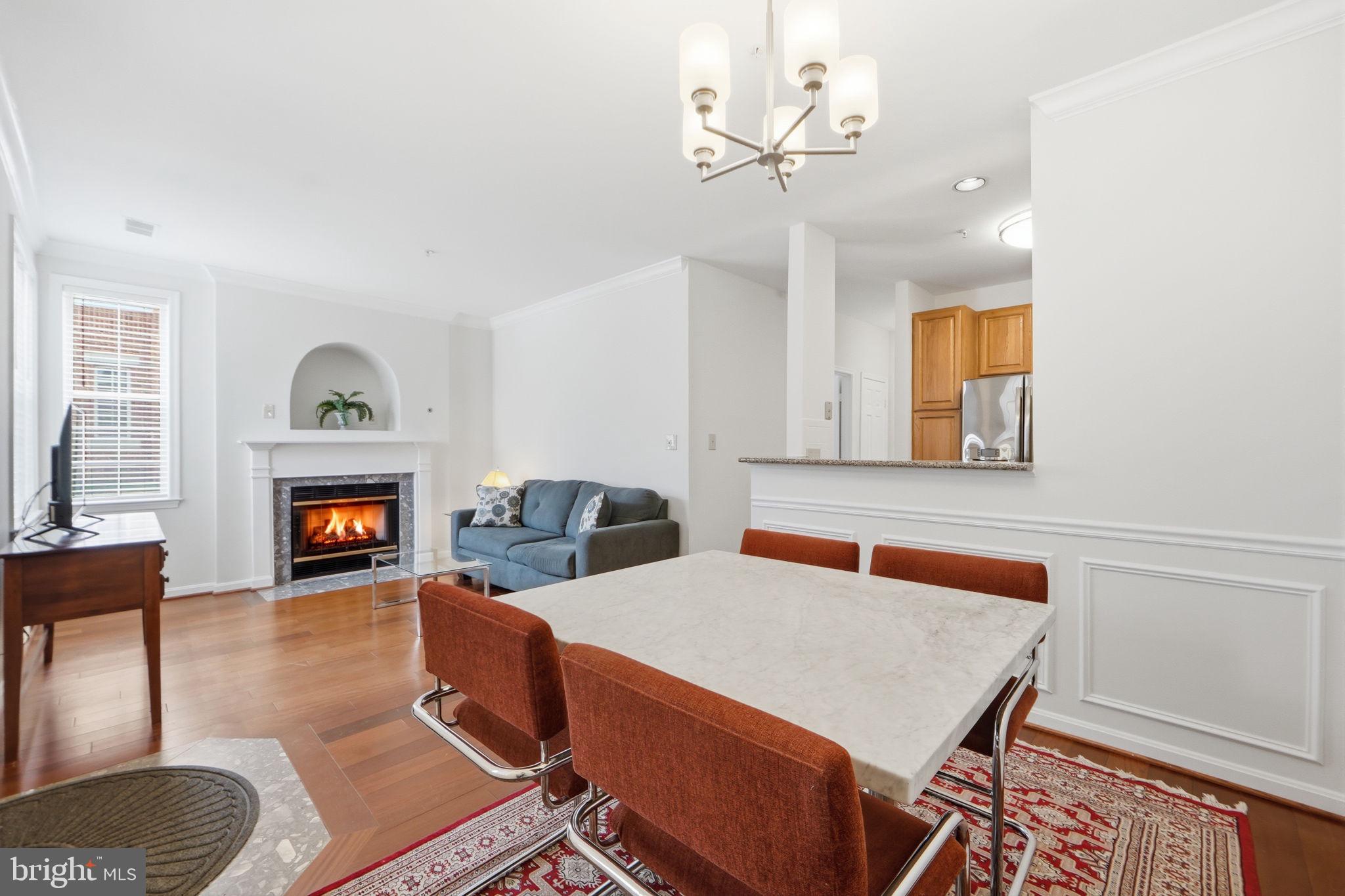7023 Haycock Road Falls Church, VA 22043 - Photo 9 of 22 a living room with furniture and a fireplace