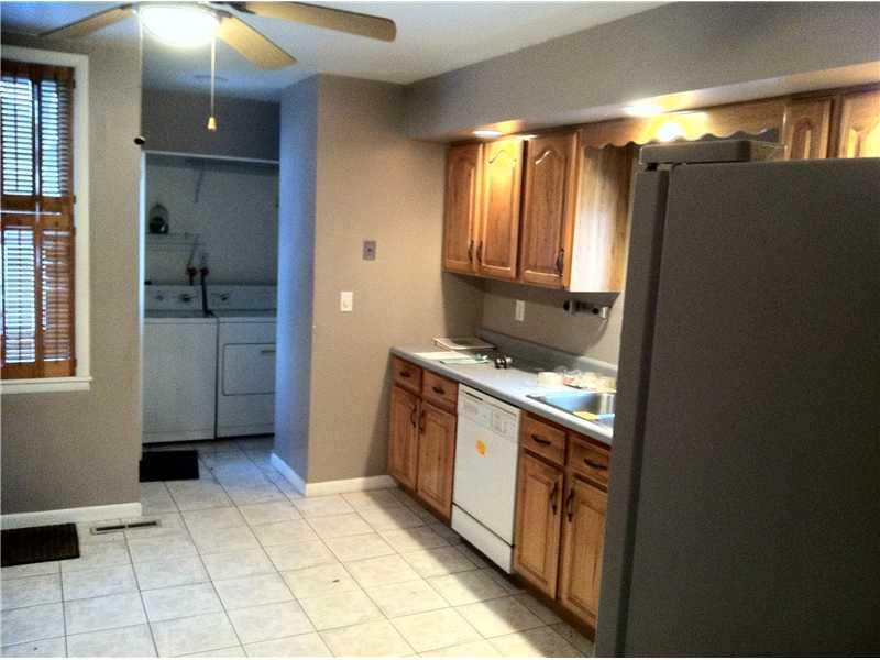 4 Highland Drive McKees Rocks, PA 15136 - Photo 5 of 19 Kitchen. Laundry area in background